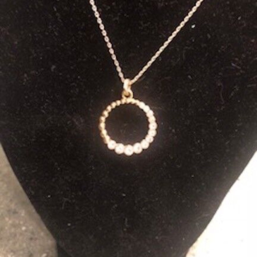 Brand New Avon gold graduated circle necklace cubic zirconia sparkle